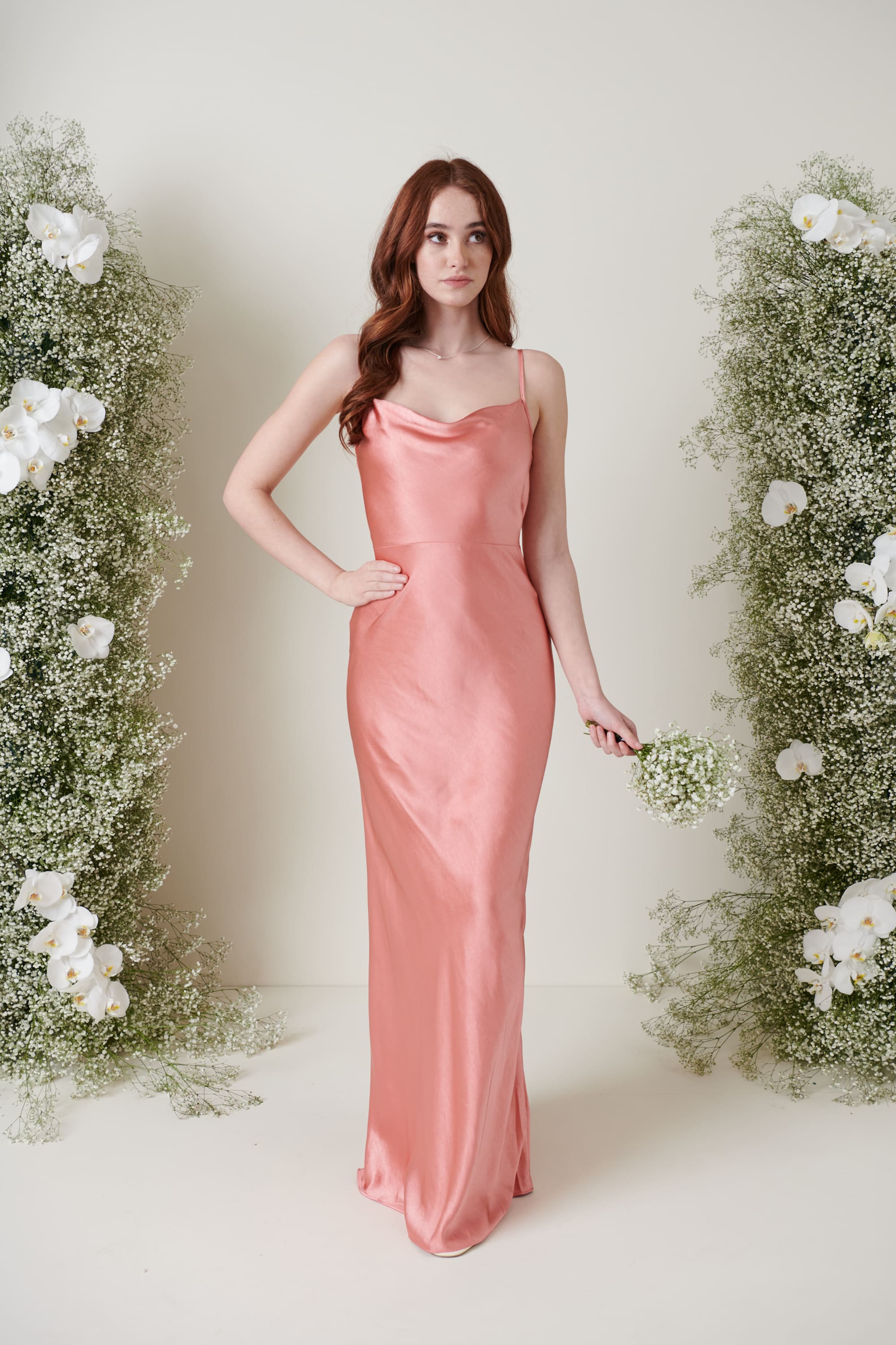 salmon bridesmaid dresses CLASSIC CUT-OUT SHEER MAXI DRESS IN PINK | CULT MIA Ana Maria wears a Size S. Salmon Color Bridesmaid Dresses