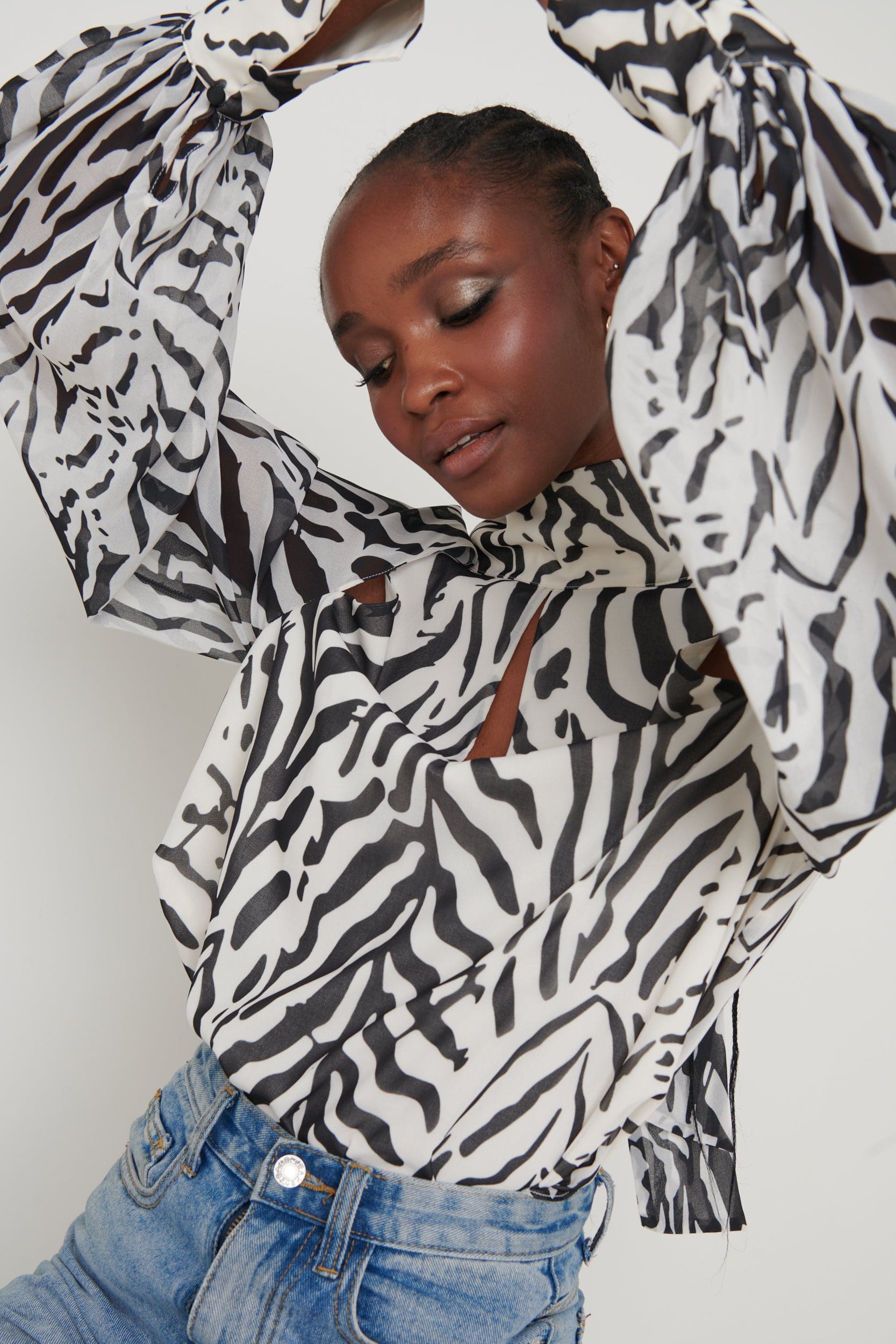 Romy Cut Out High Neck Printed Blouse - Zebra Abstract – Pretty Lavish